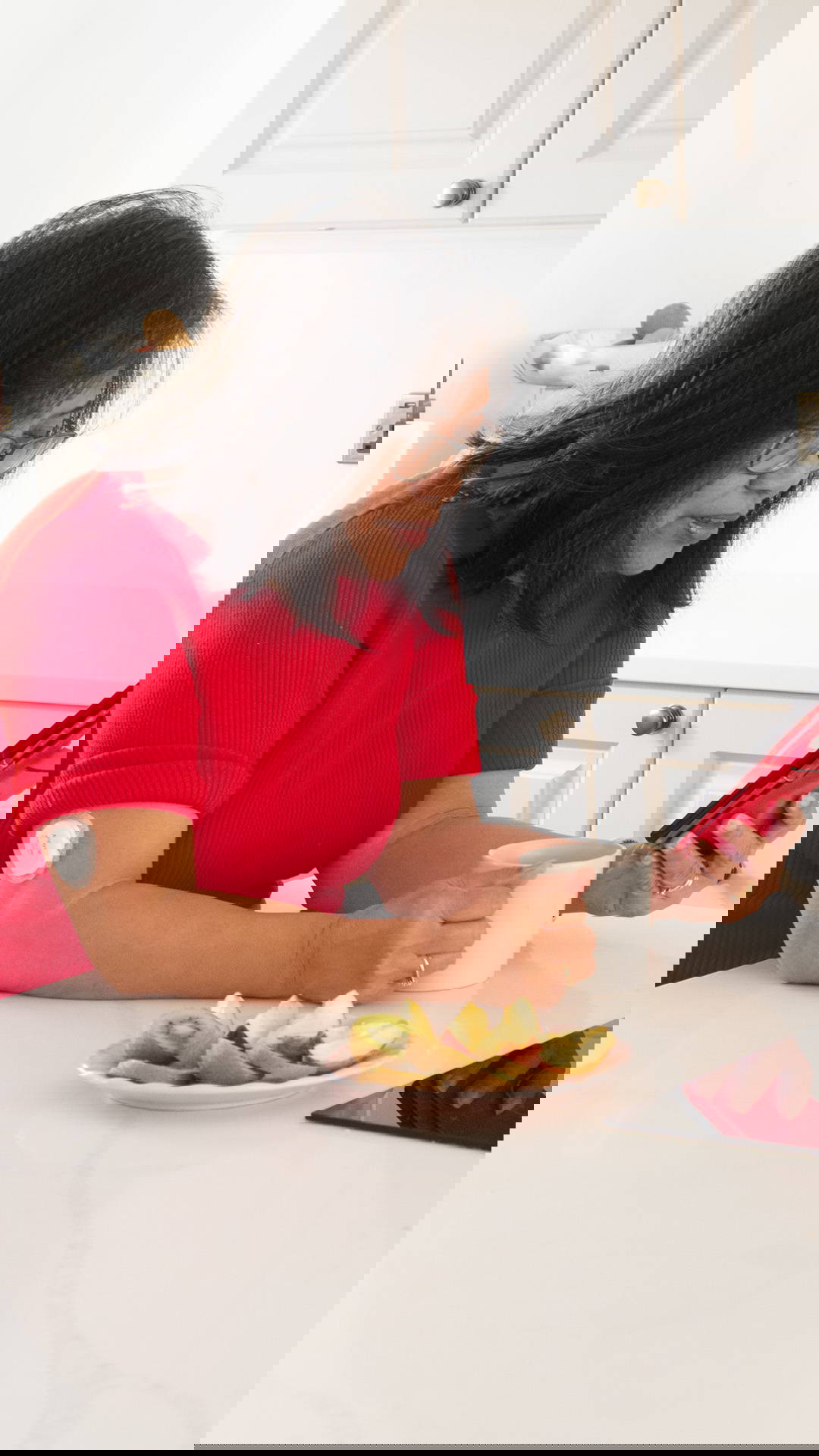 Yuwell Anytime CGM user checking glucose data on her phone